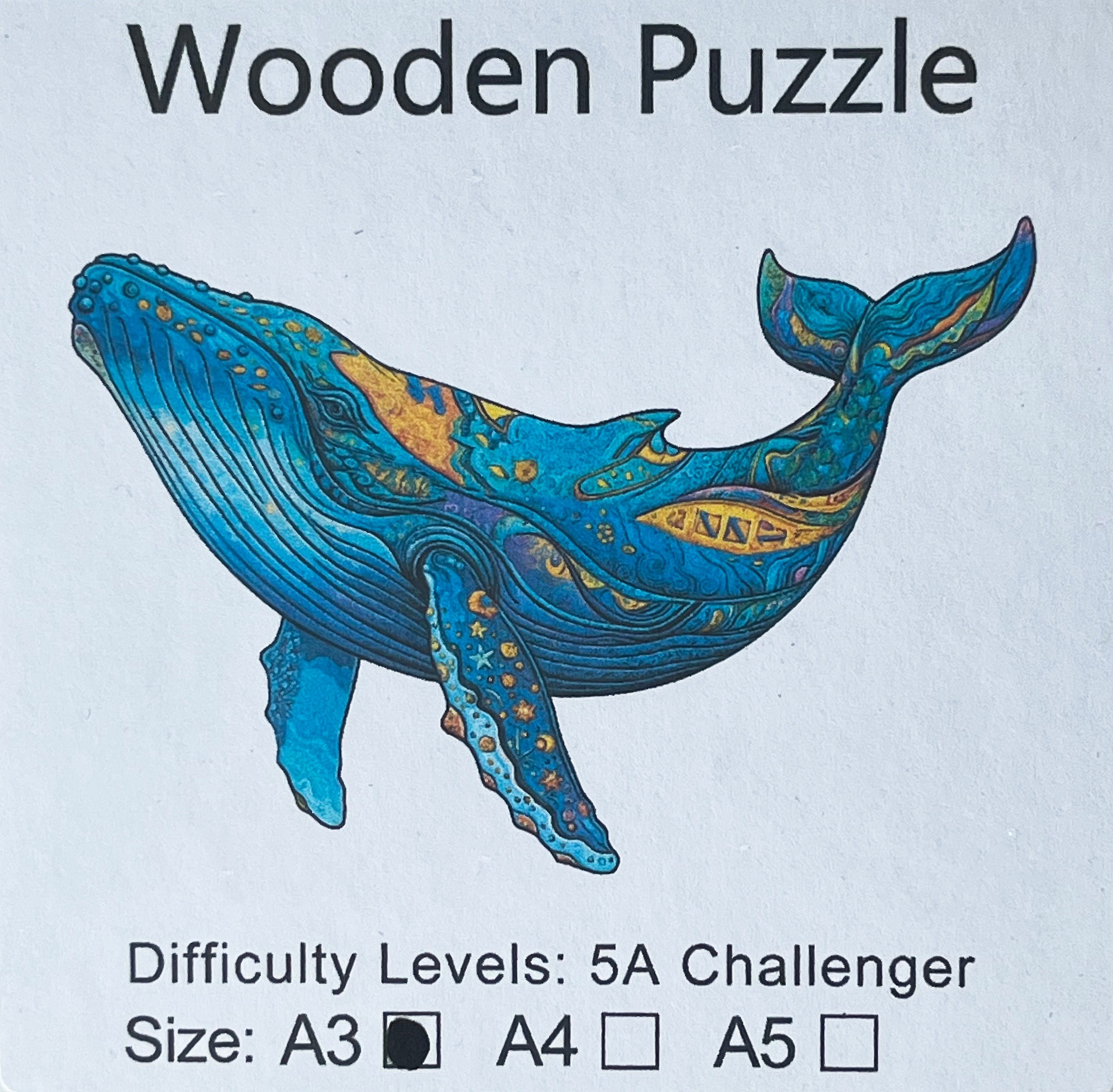 Puzzle A3 en bois laminé dans une boîte cartonnée avec sac de transport et reproduction. Pièces irrégulières uniques rendant l'assemblage encore plus enrichissant, La Baleine Bleue